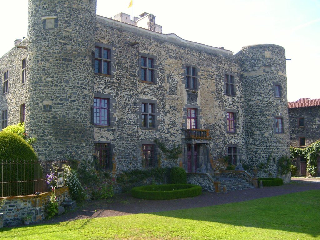 Castle of Opme: A Medieval Fortress and Historic Residence in France 1 Castle of Opme