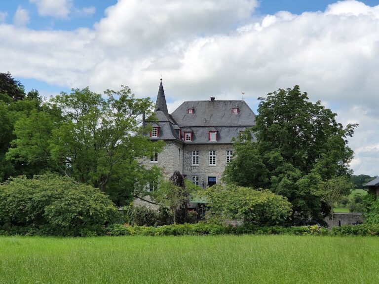 Castle Libermé: A Moated Historic Complex in Belgium