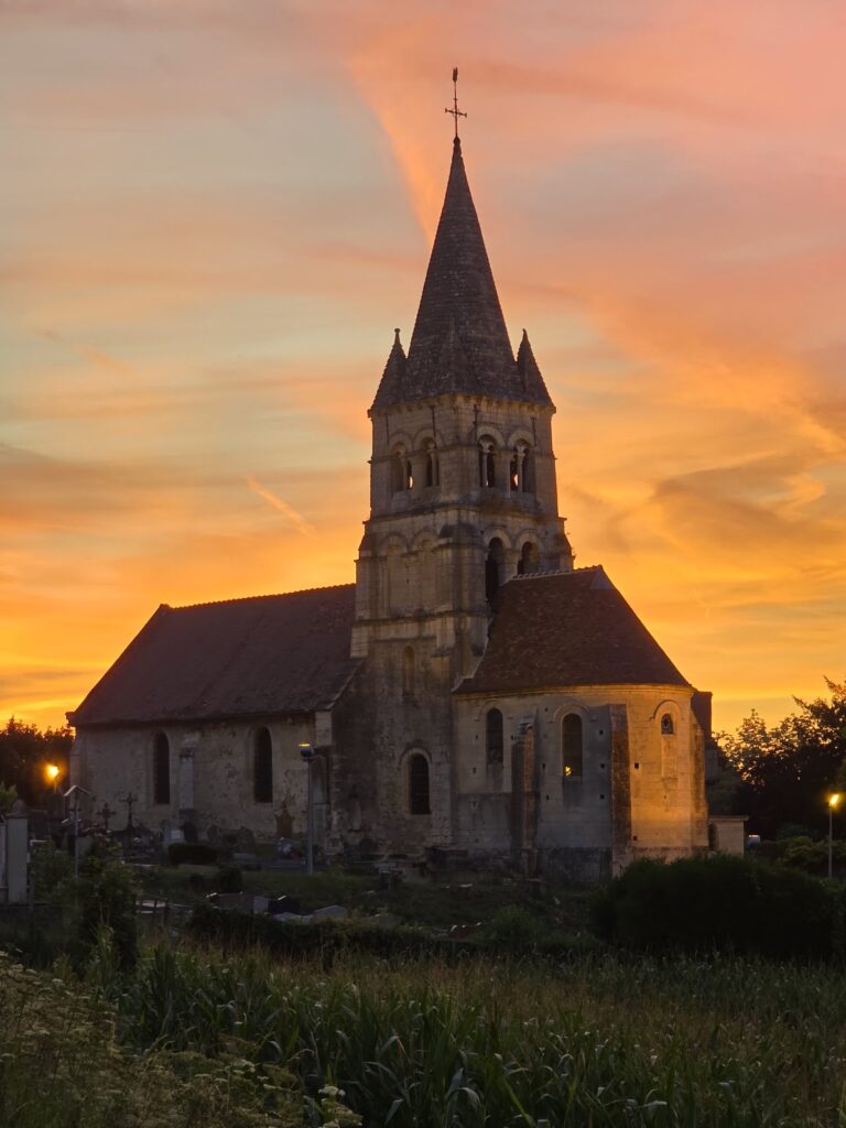 Saint-Vaast Church of Saint-Vaast-de-Longmont: A Romanesque and Gothic Parish Church
