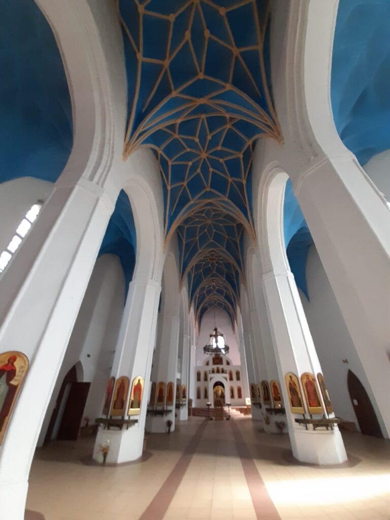 Church in Pravdinsk: A Gothic Brick Church and Orthodox Parish 2 Church in Pravdinsk