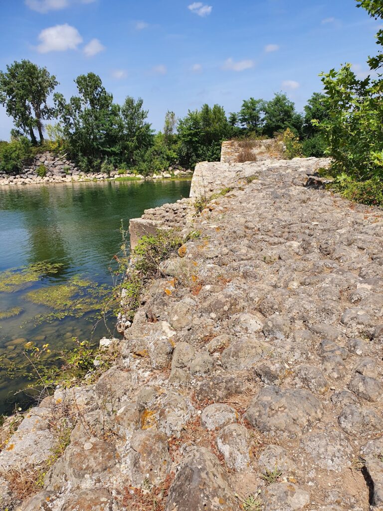 Roman Bridge: A Historic River Crossing at Saint-Thibéry, France 3 Roman Bridge